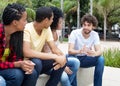 Group of international young adults in discussion about politics Royalty Free Stock Photo