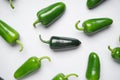 Group of jalapeno peppers on a white background, top view. Close-up. Green chili pepper Royalty Free Stock Photo