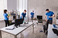 Janitors Cleaning The Office Royalty Free Stock Photo