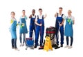 Group Of Janitors Gesturing Thumbs Up Royalty Free Stock Photo