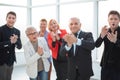 Group of joyful excited business people having fun in office Royalty Free Stock Photo