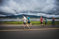 Group of 10K Runners in front of a beautiful Mountain Landscape Royalty Free Stock Photo