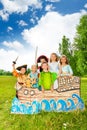 Group of kids in different costumes stand on ship Royalty Free Stock Photo