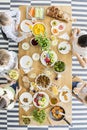 Group of kids eating healthy dinner with vegetables