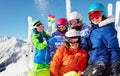 Group of kids have fun with snow and mountain ski Royalty Free Stock Photo