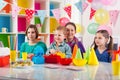 Group of kids having fun at birthday party Royalty Free Stock Photo