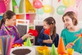 Group of kids having fun at birthday party Royalty Free Stock Photo