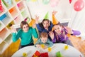 Group of kids having fun at birthday party Royalty Free Stock Photo