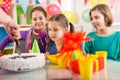 Group of kids having fun at birthday party Royalty Free Stock Photo