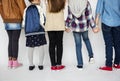 Group of Kids Holding Hands Behind Rear View on White Blackground Royalty Free Stock Photo