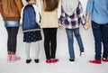 Group of Kids Holding Hands Behind Rear View on White Blackground