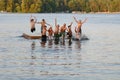 Group of kids jumping into Lake Royalty Free Stock Photo