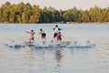 Group of kids jumping into Lake Royalty Free Stock Photo