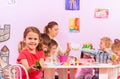 Group of kids in origami preschool class Royalty Free Stock Photo