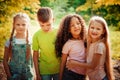 Group of Kids Playing Cheerful Park Outdoors. Children Friendship Concept Royalty Free Stock Photo