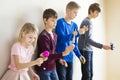 Group of kids playing kendama