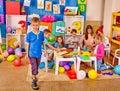 Group kids in preschool interior Royalty Free Stock Photo