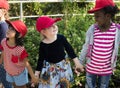 Group of kids school field trips learning outdoors botanic park