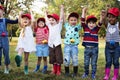 Group of kids school field trips learning outdoors botanic park Royalty Free Stock Photo