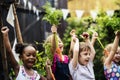 Group of kids school friends hand raised happiness smiling learn