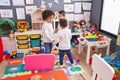 Group of kids students dancing at kindergarten Royalty Free Stock Photo