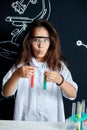 Group of kids and teachers carrying out a science experiment