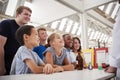 Group of kids with teachers having fun at a science centre Royalty Free Stock Photo