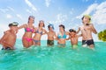 Group of kids together have fun in the sea Royalty Free Stock Photo