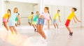 Group of kids training modern dance moves