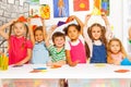 Group of kids with triangle cardboard shapes