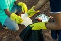 Group of kids volunteer help garbage collection charity.