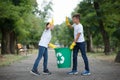 Group of kids volunteer help garbage collection charity environment, selective soft focus. Team work.