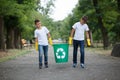 Group of kids volunteer help garbage collection charity environment, selective soft focus. Team work.