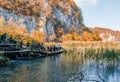 Group of kids walking on a wooden deck in Plitvice Lakes national park, Croatia