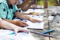 Group of kindergarten kids friends drawing art class outdoors Royalty Free Stock Photo