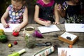 Group of kindergarten kids friends drawing imagination art on th Royalty Free Stock Photo