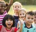 Group of kindergarten kids friends playing playground fun and sm