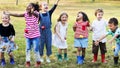 Group of kindergarten kids learning gardening outdoors field trips Royalty Free Stock Photo