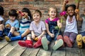 Group of kindergarten kids little farmers learning gardening Royalty Free Stock Photo