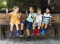 Group of kindergarten kids little farmers learning gardening Royalty Free Stock Photo