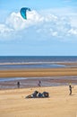 Group of kite surfers on the beach. Old Hunstanton, Norfolk, England.