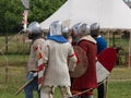 Group of Knights with Silver Helmets and Shields ready for Battle Royalty Free Stock Photo