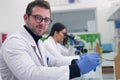 Group of  Laboratory scientists working at lab with test tubes, test or research in clinical laboratory.Science, chemistry, Royalty Free Stock Photo