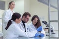 Group of  Laboratory scientists working at lab with test tubes, test or research in clinical laboratory.Science, chemistry, Royalty Free Stock Photo