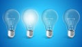 Group of lamp bulbs on blue background with single glowing bulb. Concept innovation ideas, 3d rendering Royalty Free Stock Photo