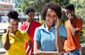 Group of latin american young adult talking at phone Royalty Free Stock Photo