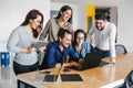 Group of latin business people working together as a teamwork while sitting at the office desk in a creative office in Mexico city Royalty Free Stock Photo