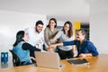 Group of latin business people working together as a teamwork while sitting at the office desk in a creative office in Mexico city Royalty Free Stock Photo