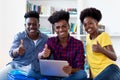 Group of laughing african american computer science students