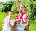 Laughing kids running on grass Royalty Free Stock Photo